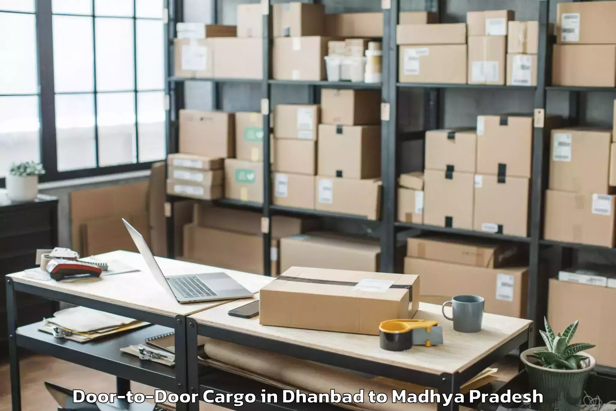 Get Dhanbad to Harpalpur Door To Door Cargo